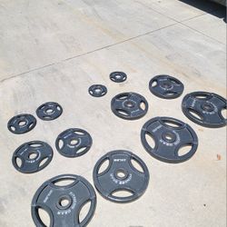 Lots Of Olympic Weights Available. 45s, 35s, 25s, 10s, 5s. $1 a pound  Very nice dumbbells A Couple Of  40 Lbs And 7 Ft Olympic Bars