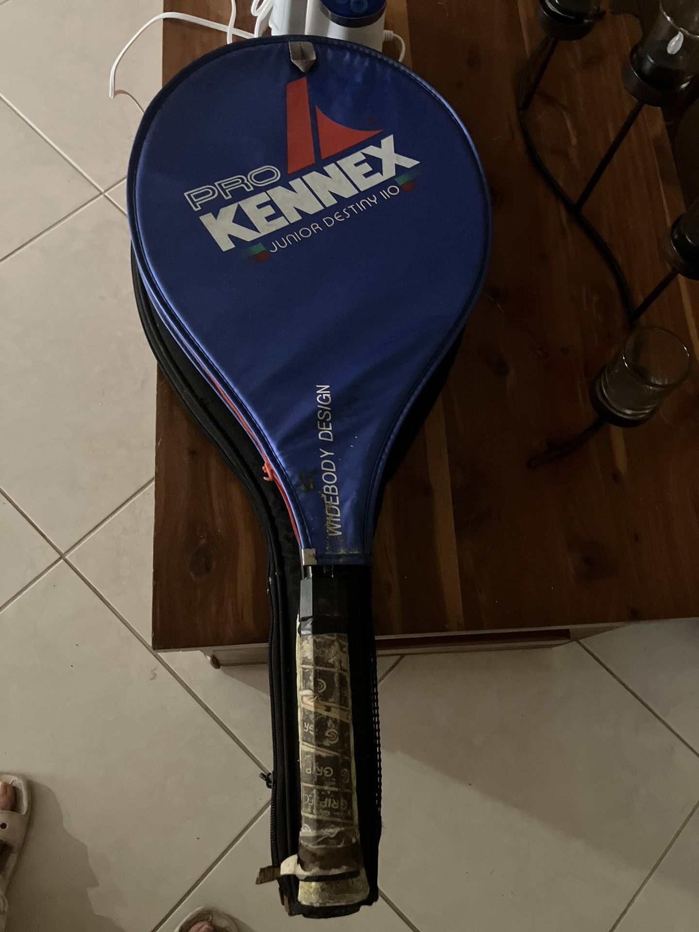 Kennel Cover And Tennis Racket