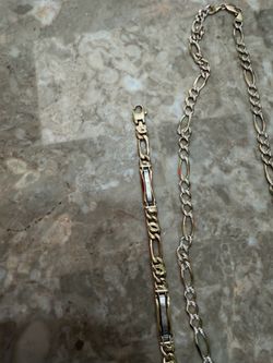 Cadena y pulsera de oro 14 kt