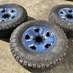 (3) ONLY THREE RAM 2500 RIMS TOYO AT3 LT285/75R18 95%