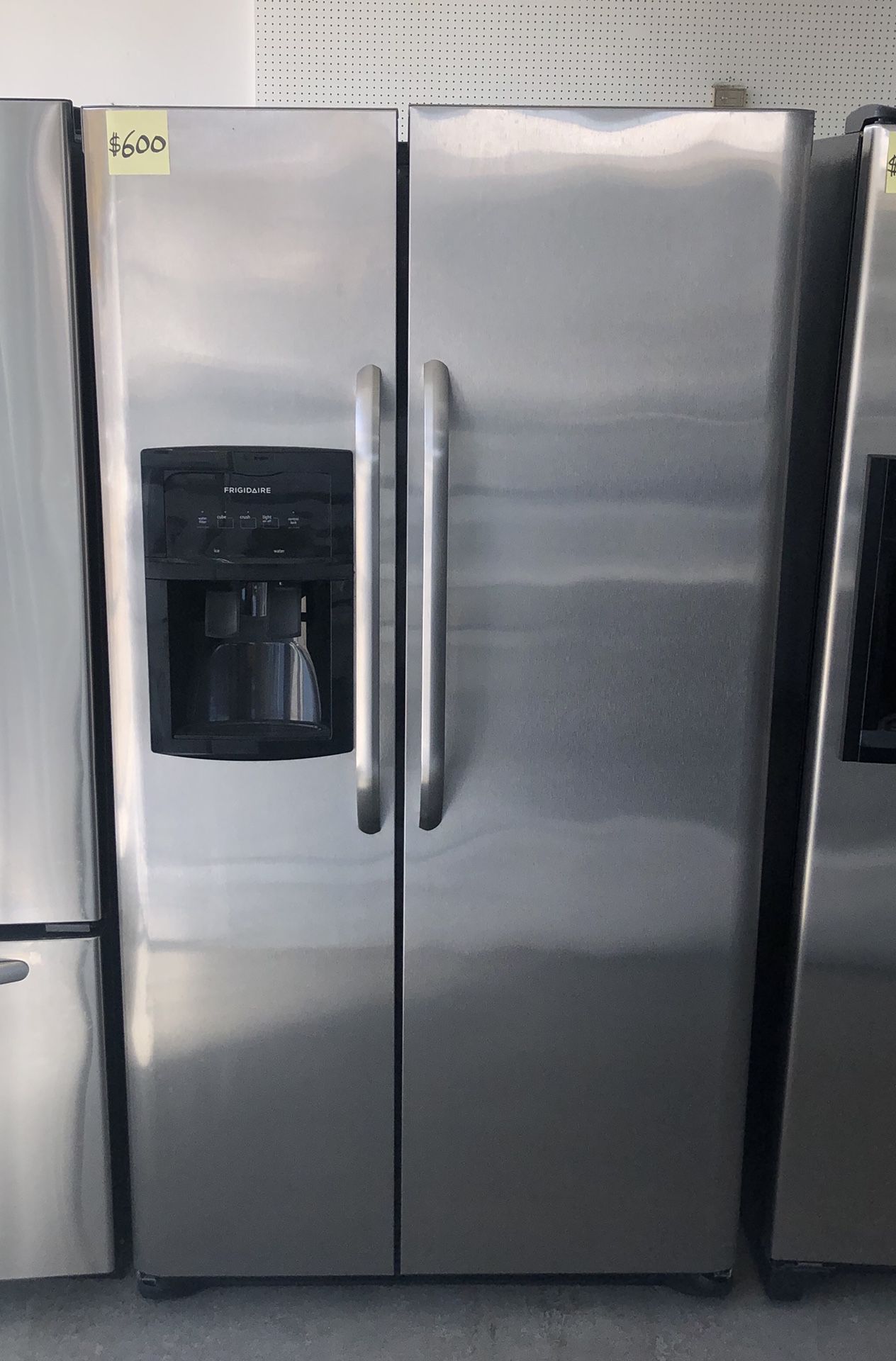 Comes with free 6 Months Warranty-like new stainless steel side by side refrigerator Frigidaire