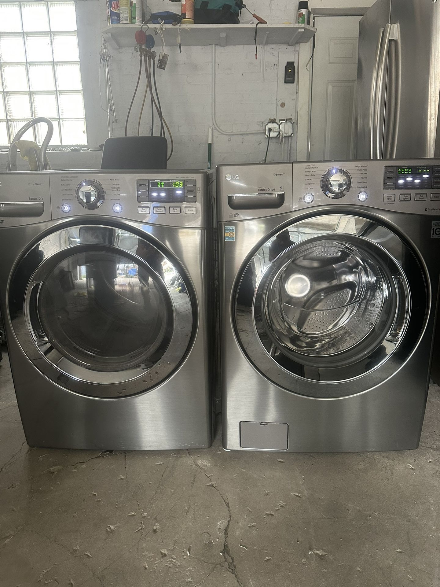 LG front load washer and LG front load gas dryer set stainless steel
