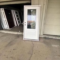 White Exterior Door with Decorative Glass Insert