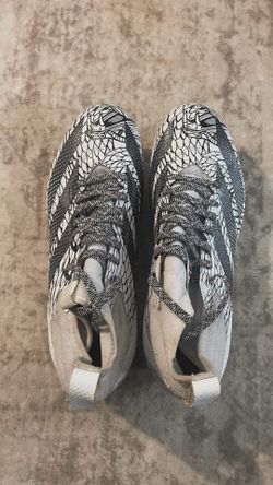 Black and white football cleats