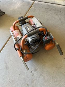 Rigid mini wheel barrow compressor