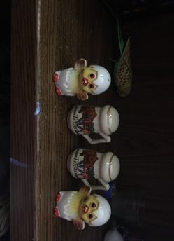 Four ceramics condiment shaker