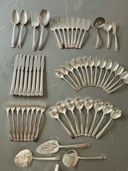 A 57 piece set of Adoration silverplate silverware by 1847 Rogers Bros of Waterbury, Connecticut