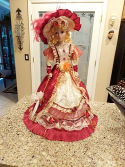 BEAUTIFUL  QUINCIETA DOLL  OPENS  UNDERNEATH LIKE A UMBRELLA  CHECK OUT MY OTHER OFFERS 