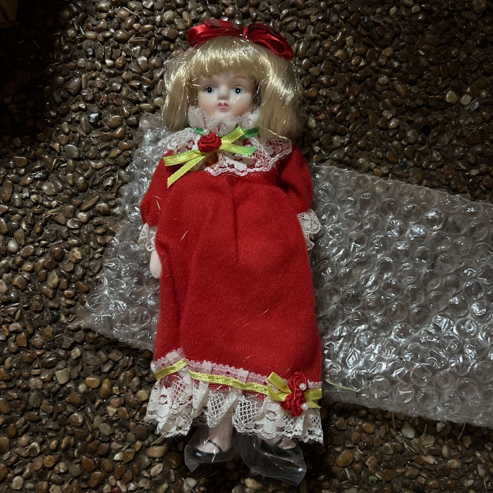 Porcelain doll, vintage baby doll, red dress, blonde hair, 8" tall, plaid bow