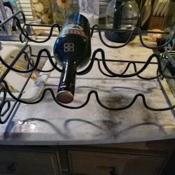 Iron Wine Rack Holds Eight Bottles