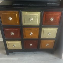 9 Drawer Glass Top Dresser 