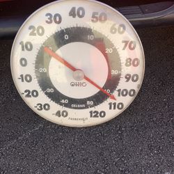 vintage Ohio Thermometer Co. "Jumbo Dial" thermometer. .The thermometer features both Fahrenheit and Celsius scales on its face.