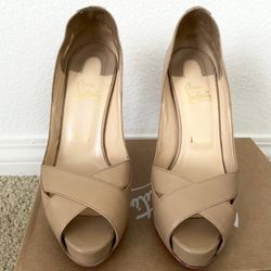 Authentic CHRISTIAN LOUBOUTIN Kid Academa 120 Pumps 41 Nude. These stylish pumps are crafted of beige leather with a 4.75 inch stiletto, a chic peep t