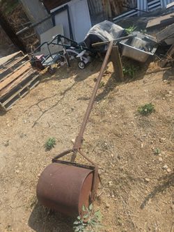 Sod roller antique yard art still usable