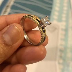 Diamond/platinum/gold engagement ring