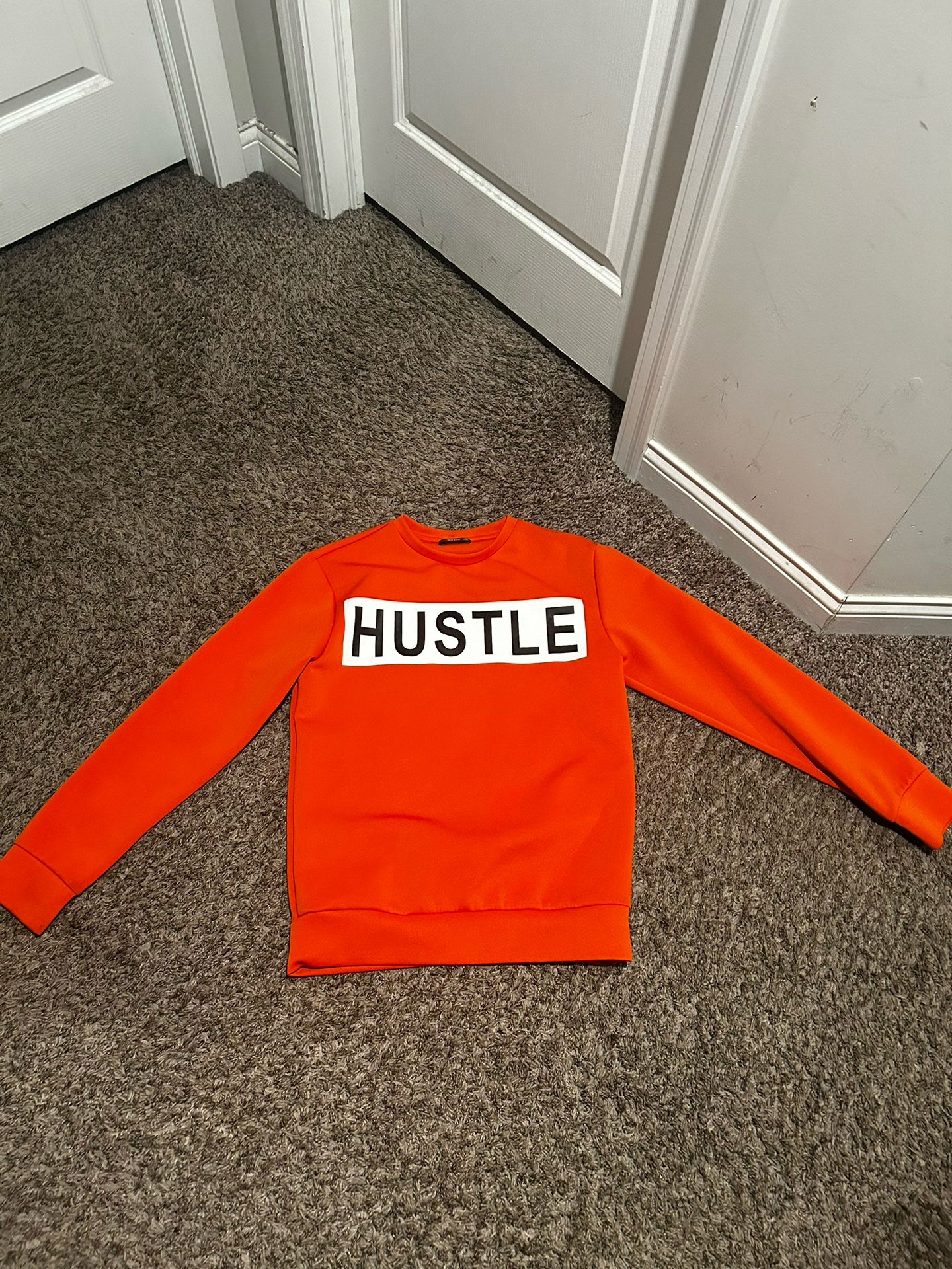 Orange hustle sweater