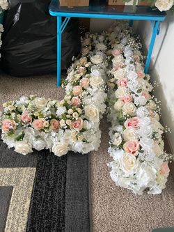 Wedding floral and Mr & Mrs sign