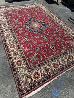 Vintage red Hand Made Rug Apx. 6’x9’