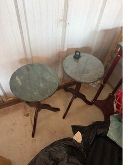 Two tables with marble tops