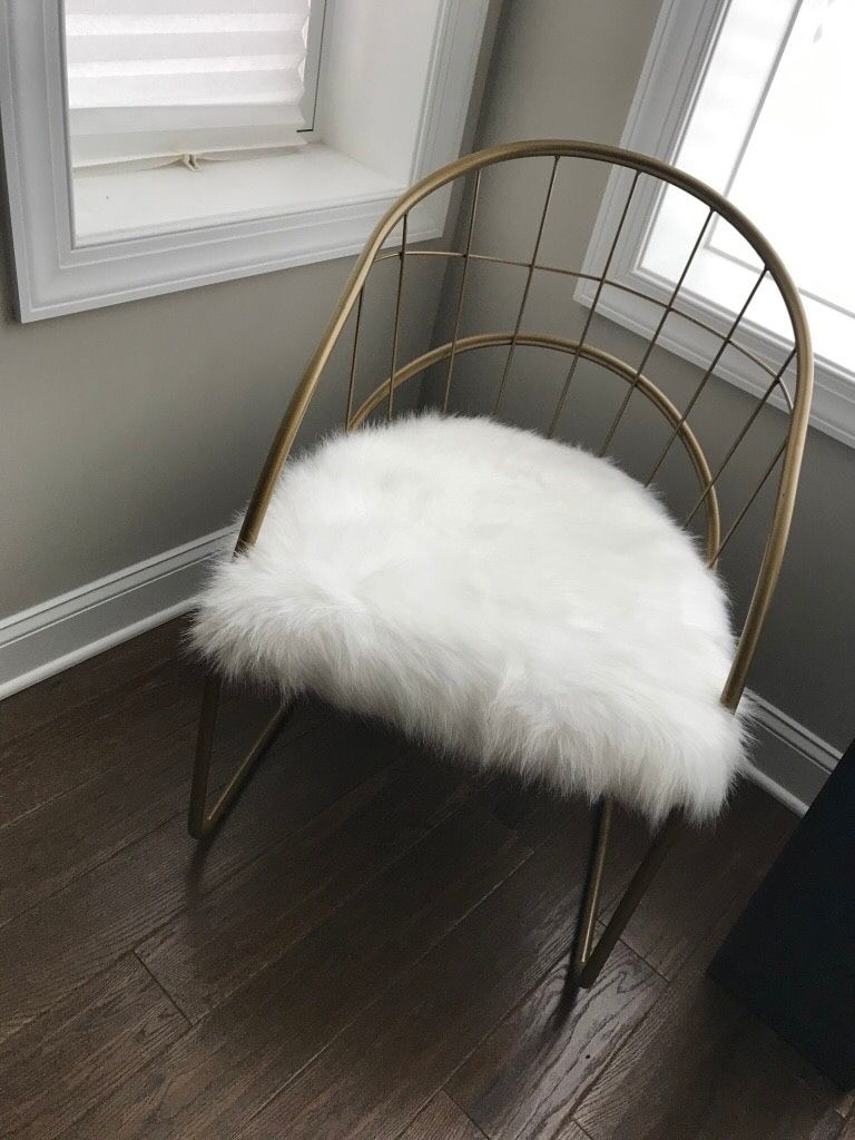 2 Gold a faux fur chairs