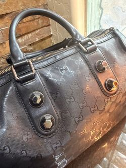Gucci Boston embossed black studs