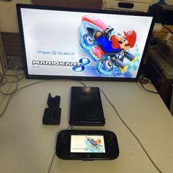 Nintendo Wii U Console system with Tablet, cords and accessories and one downloaded game