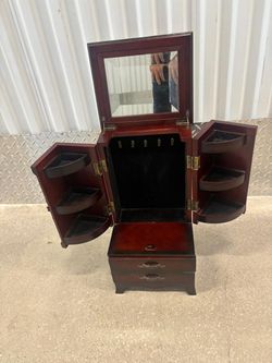Vintage mahogany finish jewelry box armoire manufactured by The Bombay Company