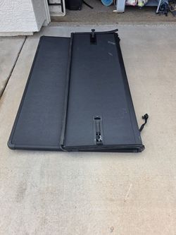 Truck bed cover.  Came off Ford F-150 XLT.  Like new.