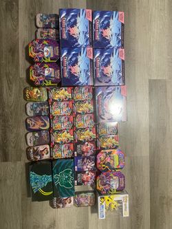 Pokémon TCG Collection: Elite Trainer Boxes, Tins, and Booster Bundles all bulk also comes with iPad