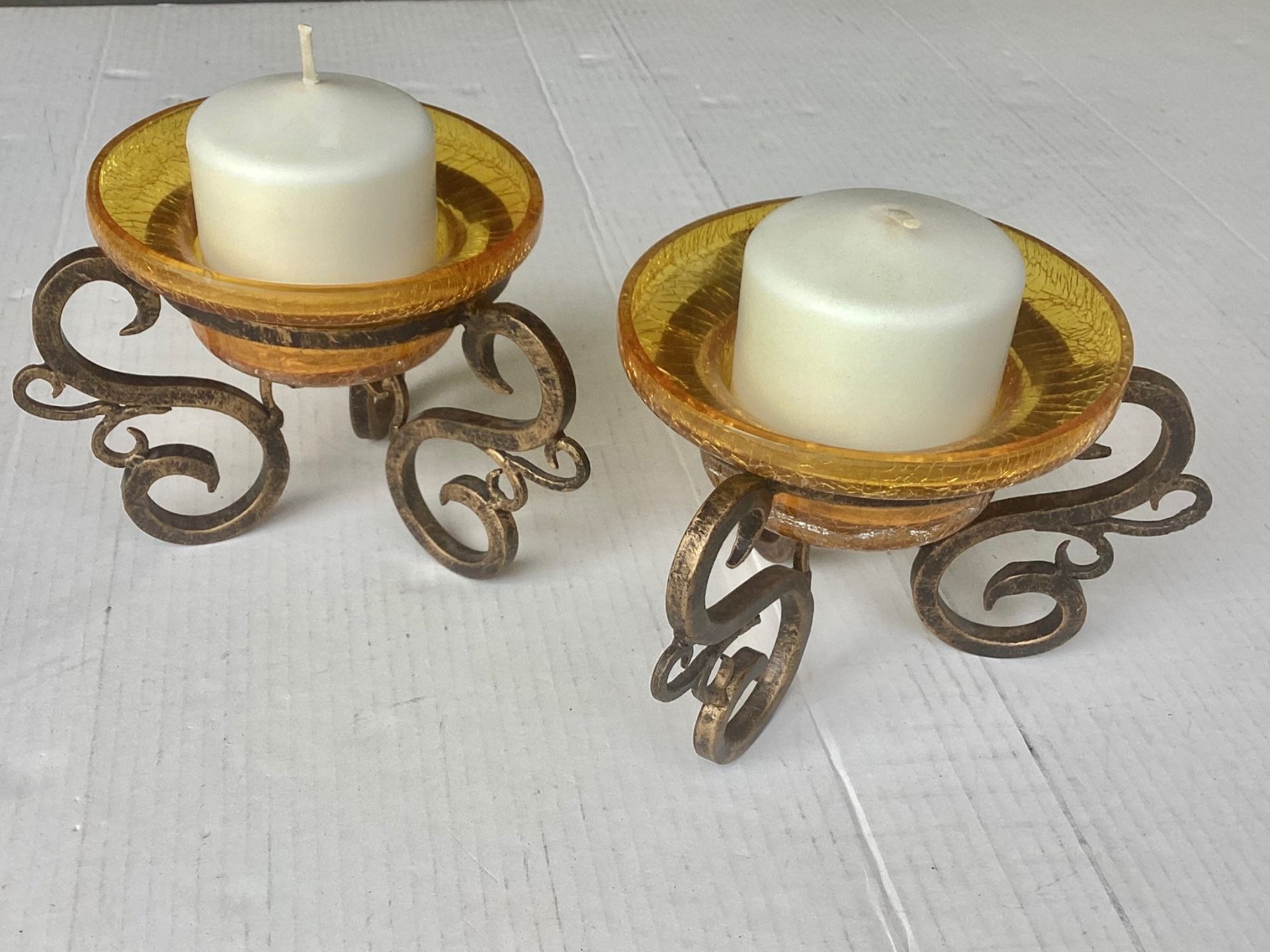 2 https://offerup.com/redirect/?o=VnRnLkdvbGQ= Iron Metal Pillar Candle Holders Glass Amber Colored Plates Decorative Distressed Finish UNUSED