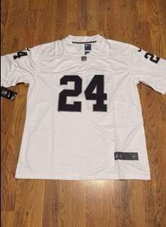 Brand new never worn White with Black Numbers Las Vegas Raiders Charles Woodson stitched Jersey