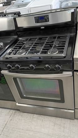 Stainless gas five burners everything works with warranty delivery available fee depends on address
