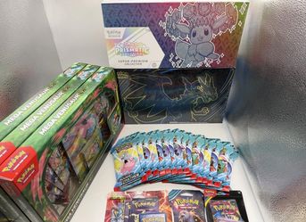 Pokémon Prismatic Evolutions Super Premium Collection (SPC) (1) Flaming UPC & 16
