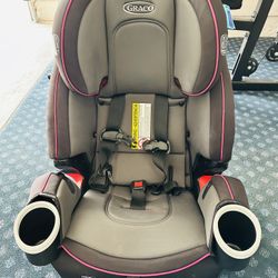 Graco® 4Ever DLX 4-in-1 Car Seat Pink Infant to Toddler Car Seat with 10 Years of Use Rear-facing Forward-facing and Booster Modes Safe Comfortable an