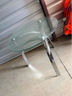 2 short glass tables
