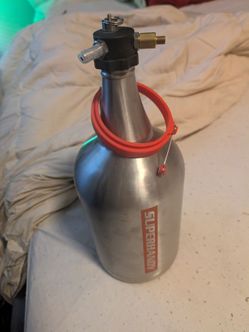 SuperHandy Stainless Steel Mini Keg Growler, which is a portable pressurized beverage dispenser typically used for storing and serving beer, cider, or