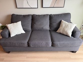 Grey three seat couch
