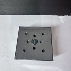 This is a Delta universal square shower head 