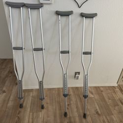 2 pair of new crutches