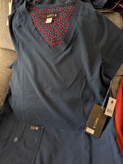 Brand name scrub tops sz. XS