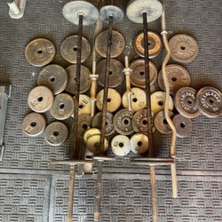 Standard weights 210lbs total plus curl bar and adjustable dumbbells extra 40,20 and 10lbs straight bars