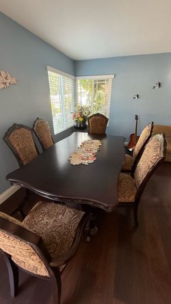 Dining table set.  With six chairs.  8’.5” x 4’.5”