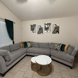 Light charcoal gray Rooms To Go couch