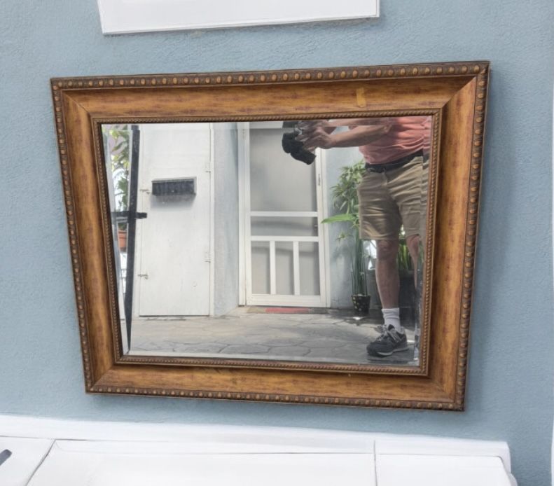 large ornate wood gold bevel wall mounted mirror : 38 x 33 .