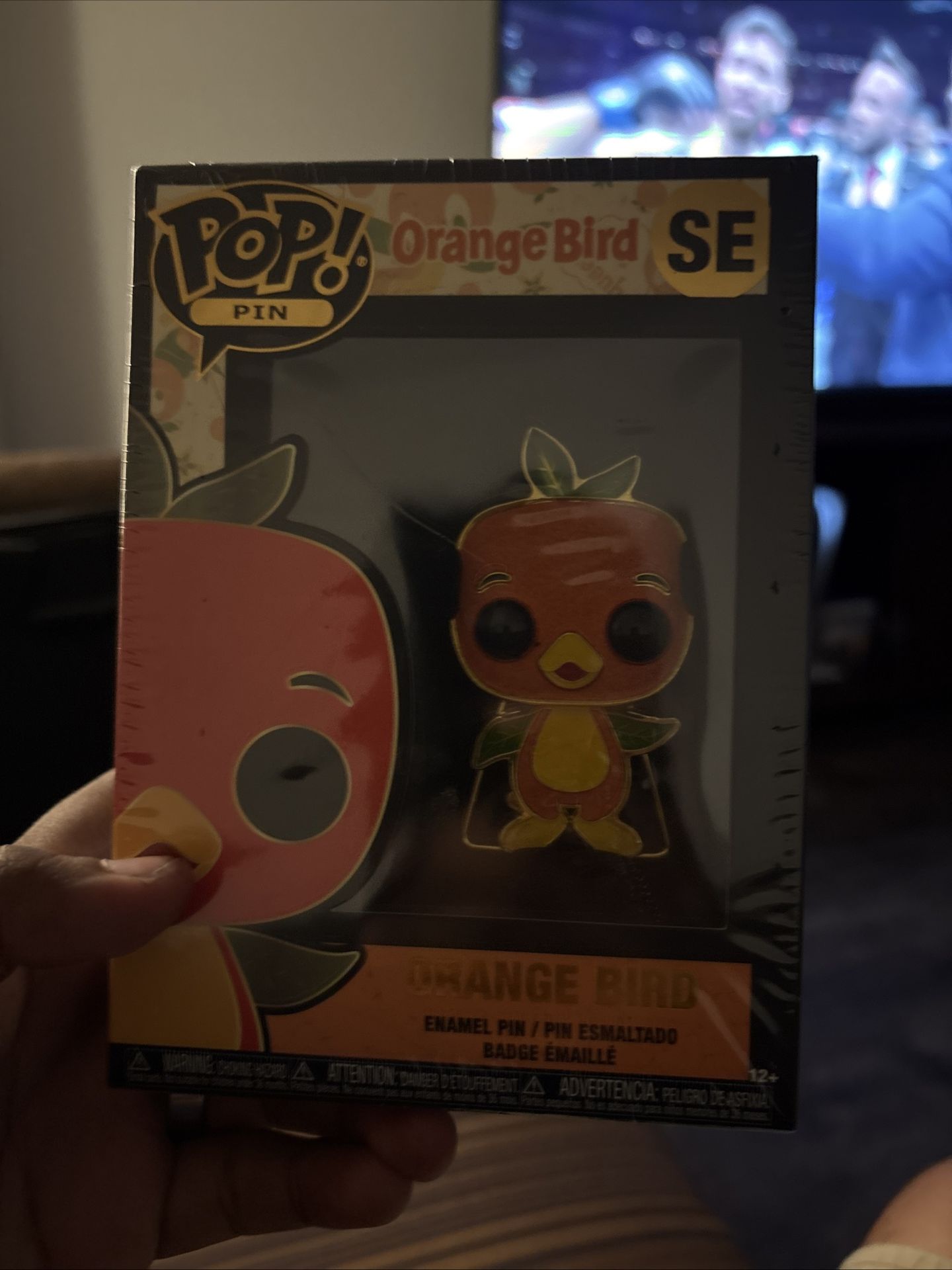 Orange bird pin