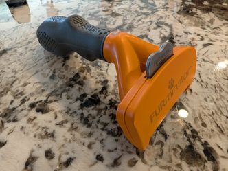 FURminator Undercoat deShedding Tool for Medium Dogs, Long Hair (Orange)