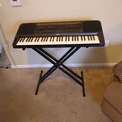 Casio. music. . sound Great   CTK1000. 9 VOLT. INPUT. 