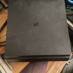 PS4 comes with a controller and hdmi cord also a charger 