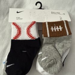 $5 NIKE SOCKS 6 PACK SOCKS 6-12 MONTHS $5 EACH PACK