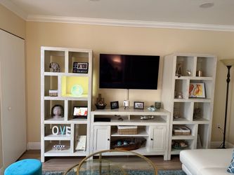 Wall entertainment center with shelves